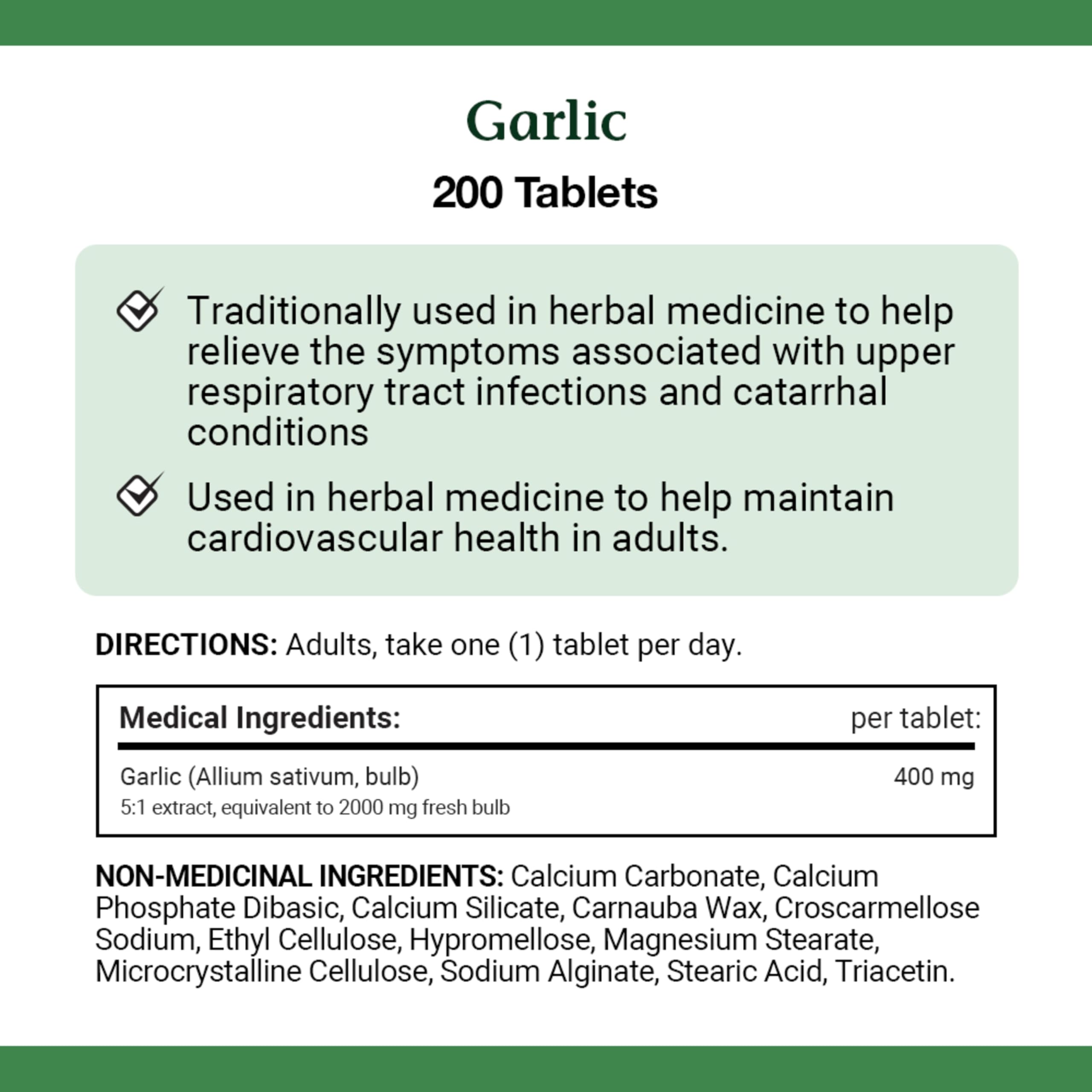 Garlic tablets arranged next to Nature's Bounty bottle