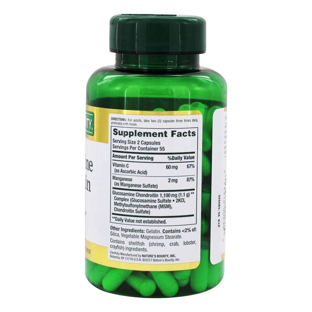 Bottle with capsules beside packaging