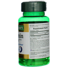 Close-up of Melatonin capsules inside bottle
