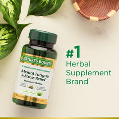 Person appearing calm and focused after taking Nature's Bounty stress relief supplement.