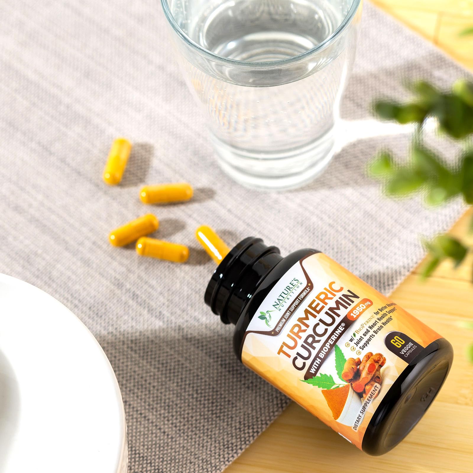 Nature's Nutrition turmeric bottle on shelf for easy storage.