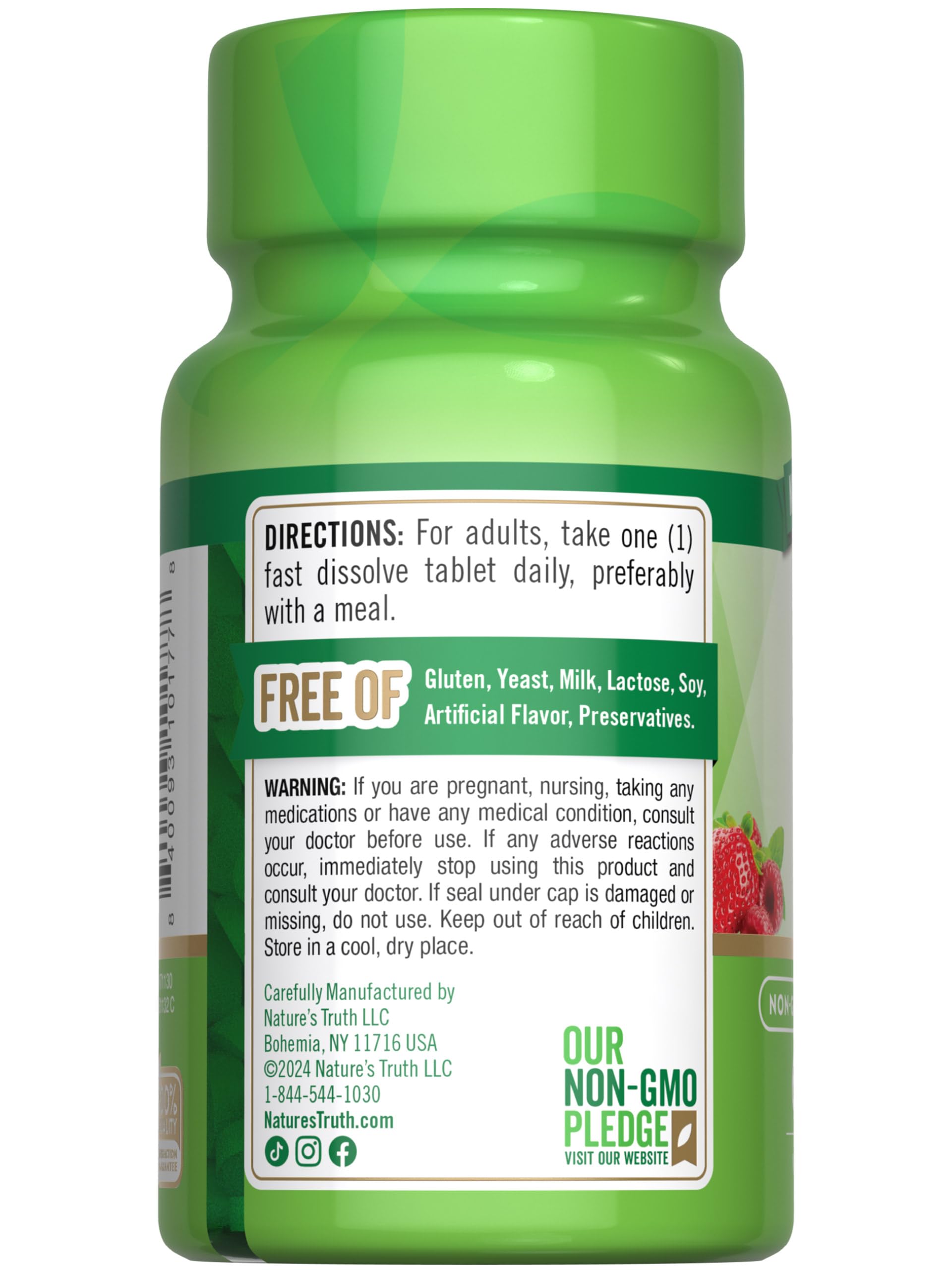 Lifestyle image of hand holding Nature's Truth B12 bottle