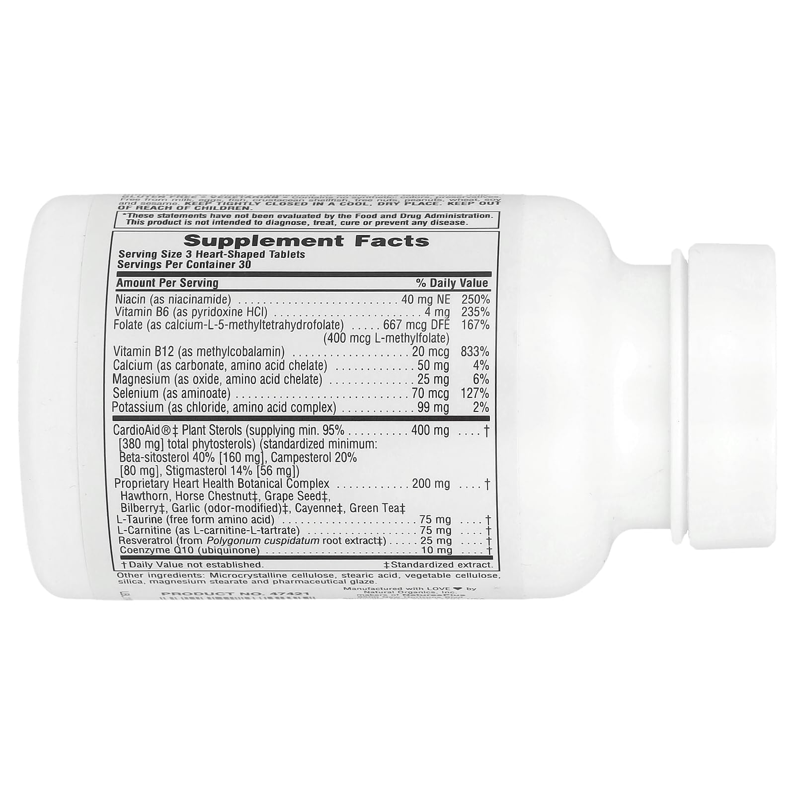 NaturesPlus Heartbeat vegan tablets close-up showing easy-to-swallow form.