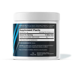 Close-up of micronized Creatine Monohydrate powder in a scoop