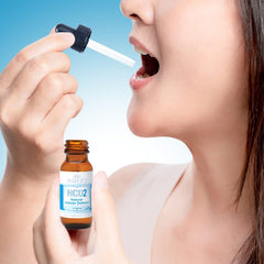 Close-up of NCD2 liquid zeolite drops bottle and dropper