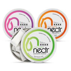 Nectr Energy Pouches Atomic Apple on lip for quick focus.