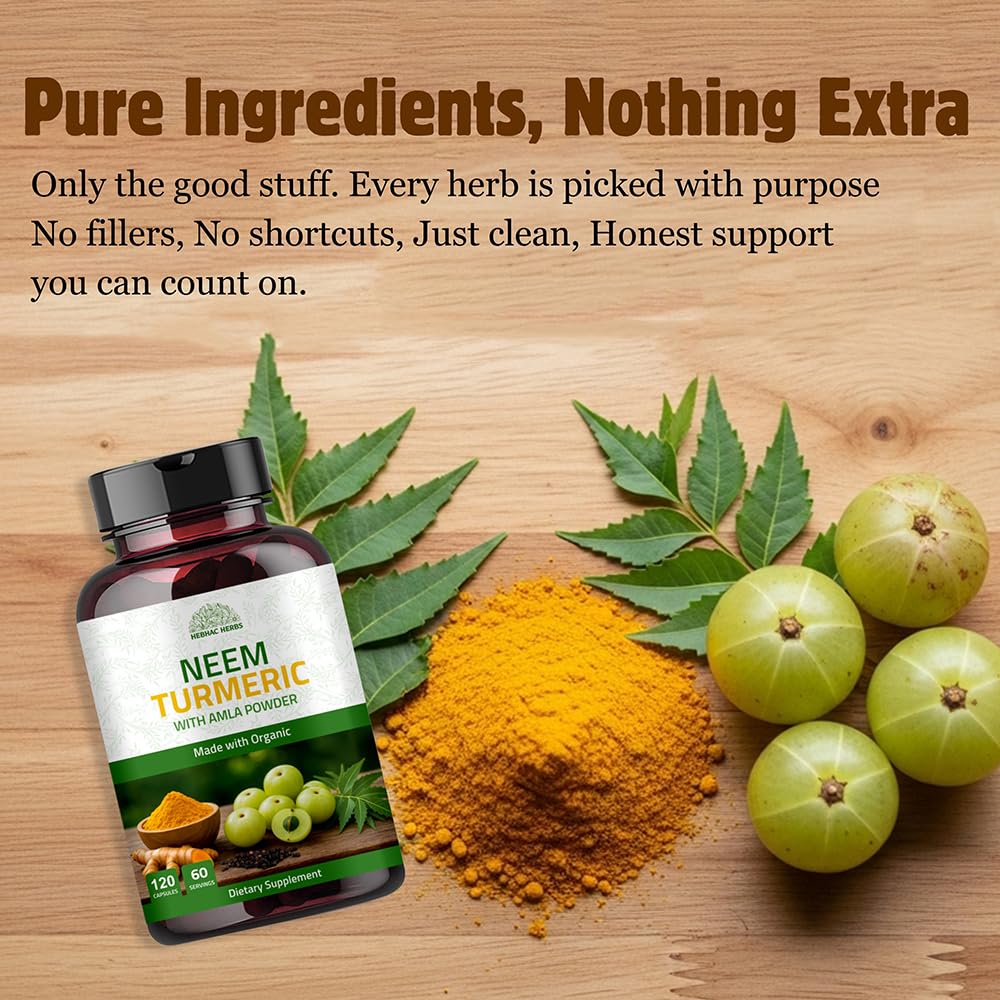 Natural herbs arrangement with Neem leaves and turmeric roots