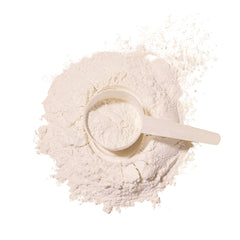 New Origins whey protein isolate bottle with smoothie demonstrates easy mixability.