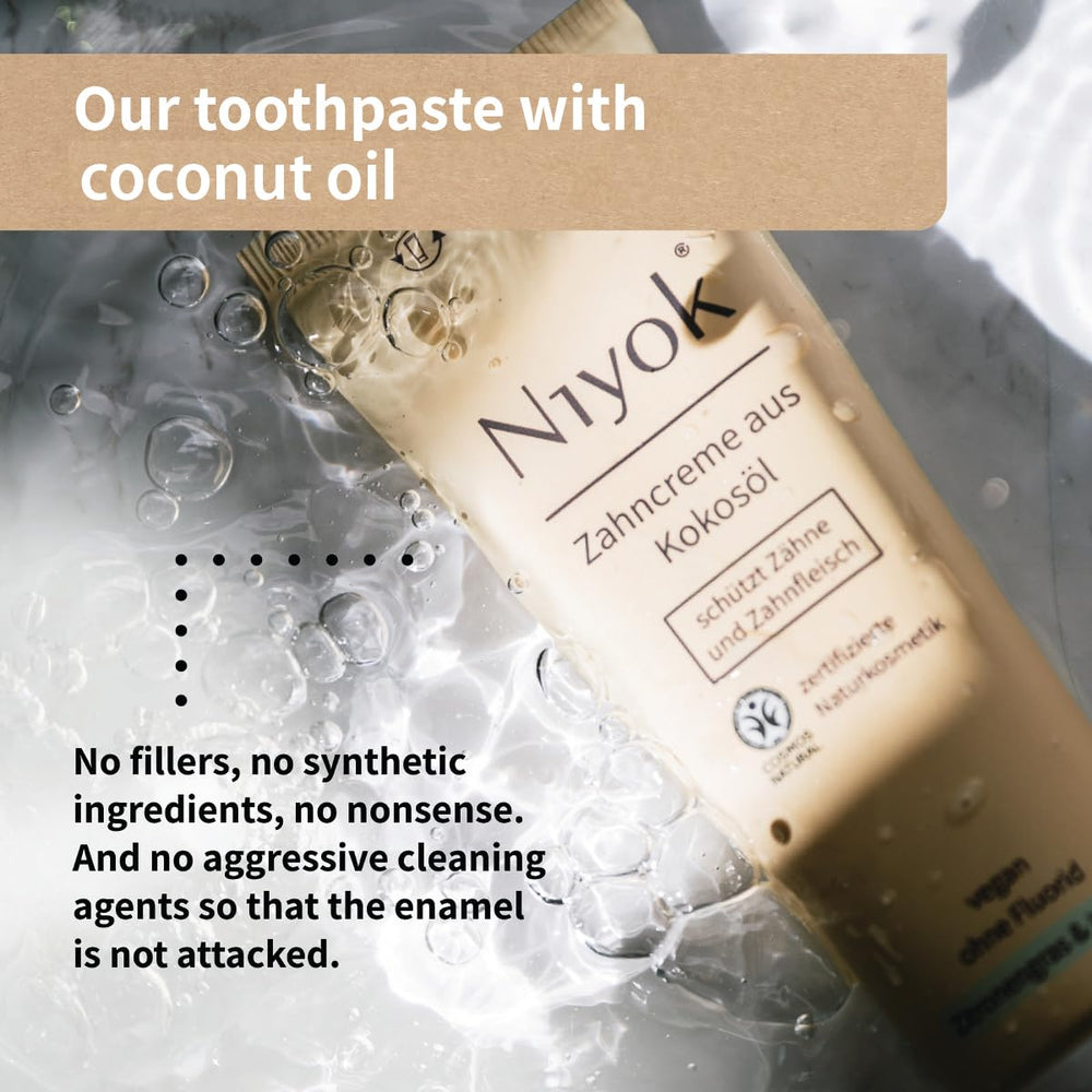 Illustration of how to use Niyok toothpaste on a toothbrush