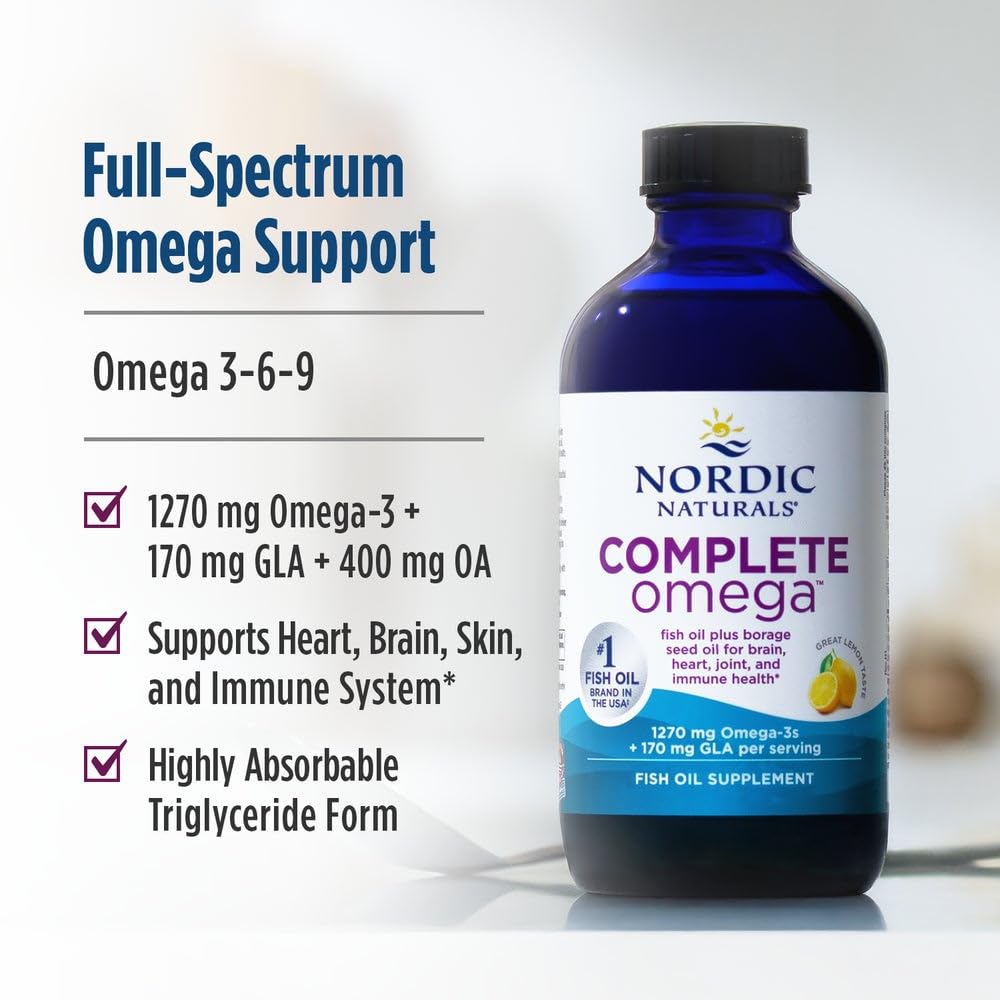 Nordic Naturals Complete Omega lemon serving in a glass with citrus.