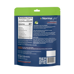 NormaLyte Apple powder dissolving into water for quick hydration preparation.