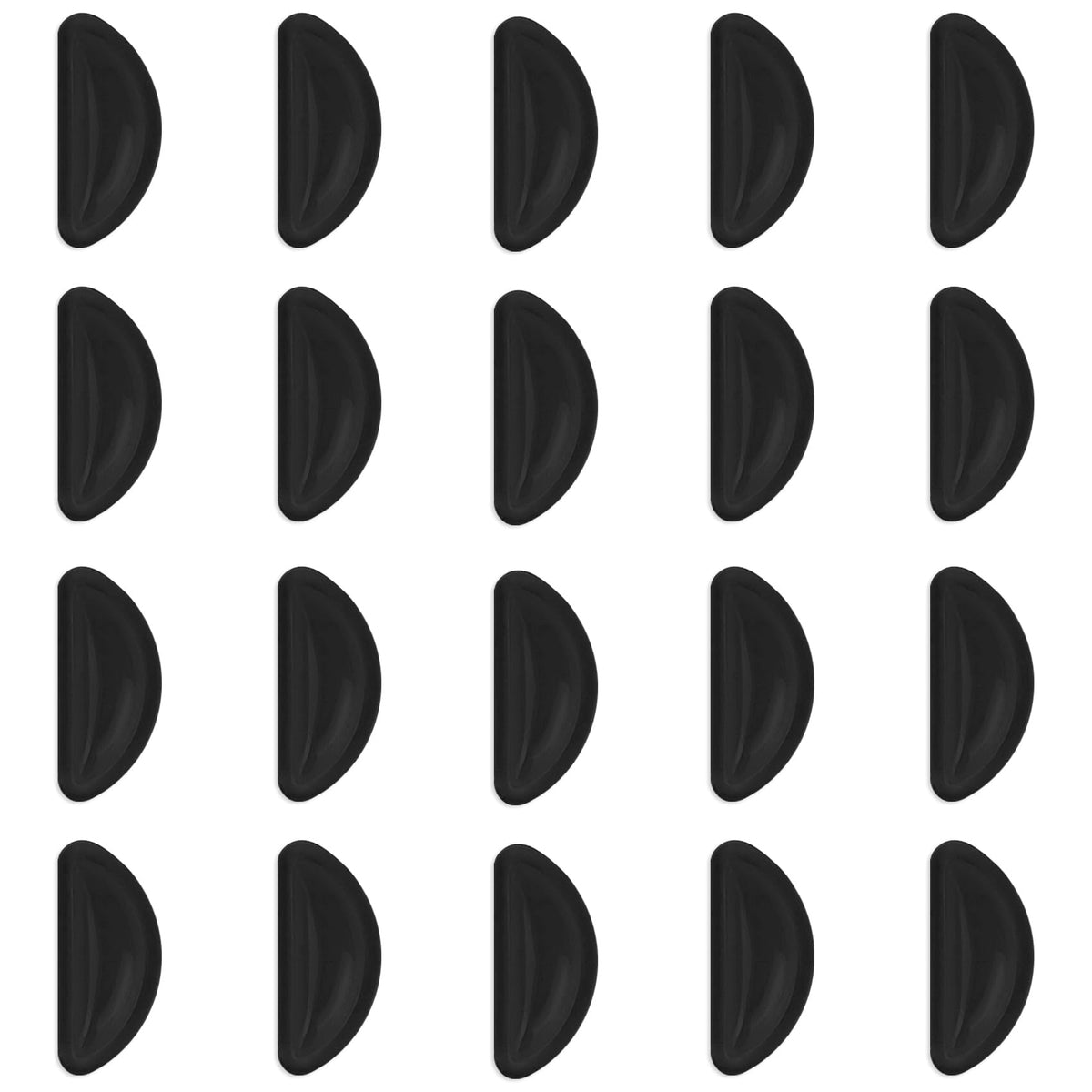 Close-up of black adhesive eyeglass nose pads on glasses