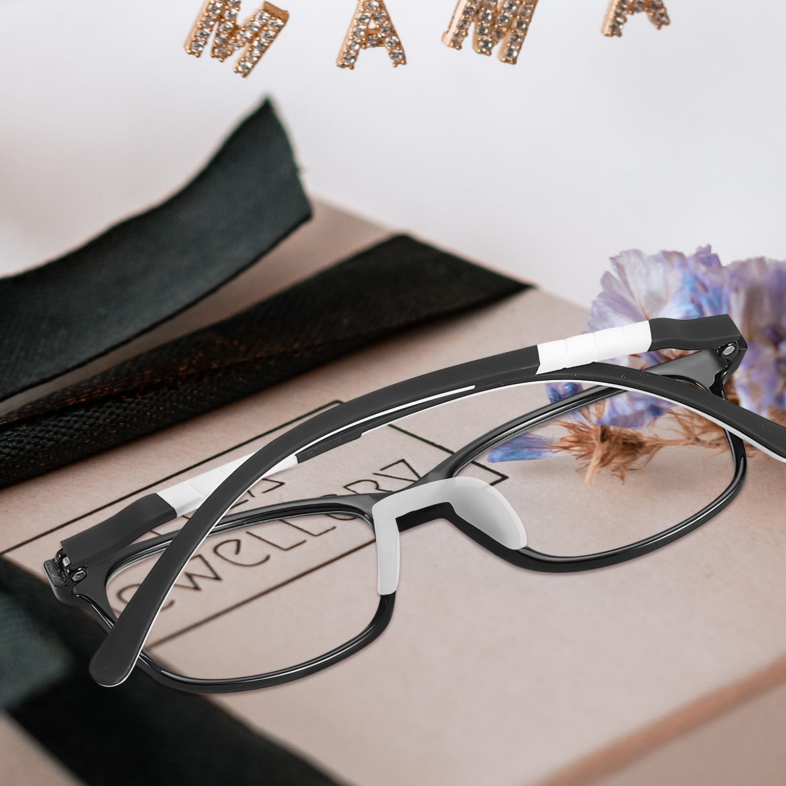 Nose pads installed on full-frame eyeglasses