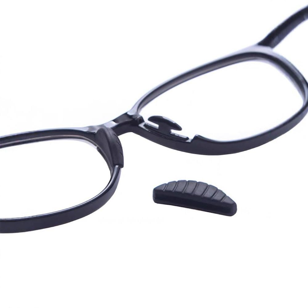 Two pairs of black silicone nose pads installed on eyewear
