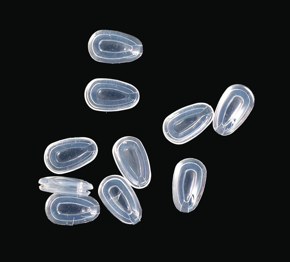 Close-up of 12x7mm clear silicone nose pads - push-on