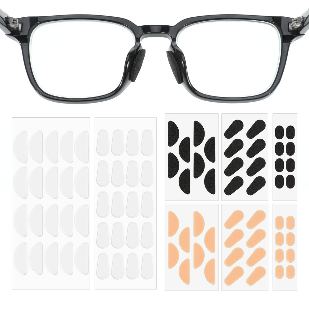 Assorted colors of eyeglass nose pads including skin, black, and transparent