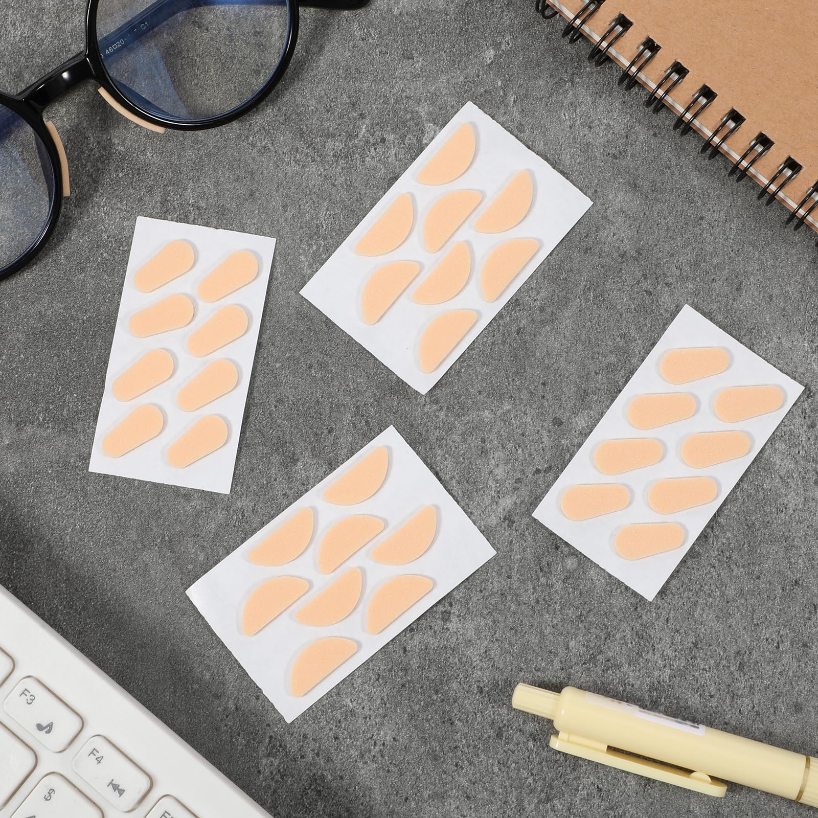 Foam nose pads on a plastic eyeglass frame