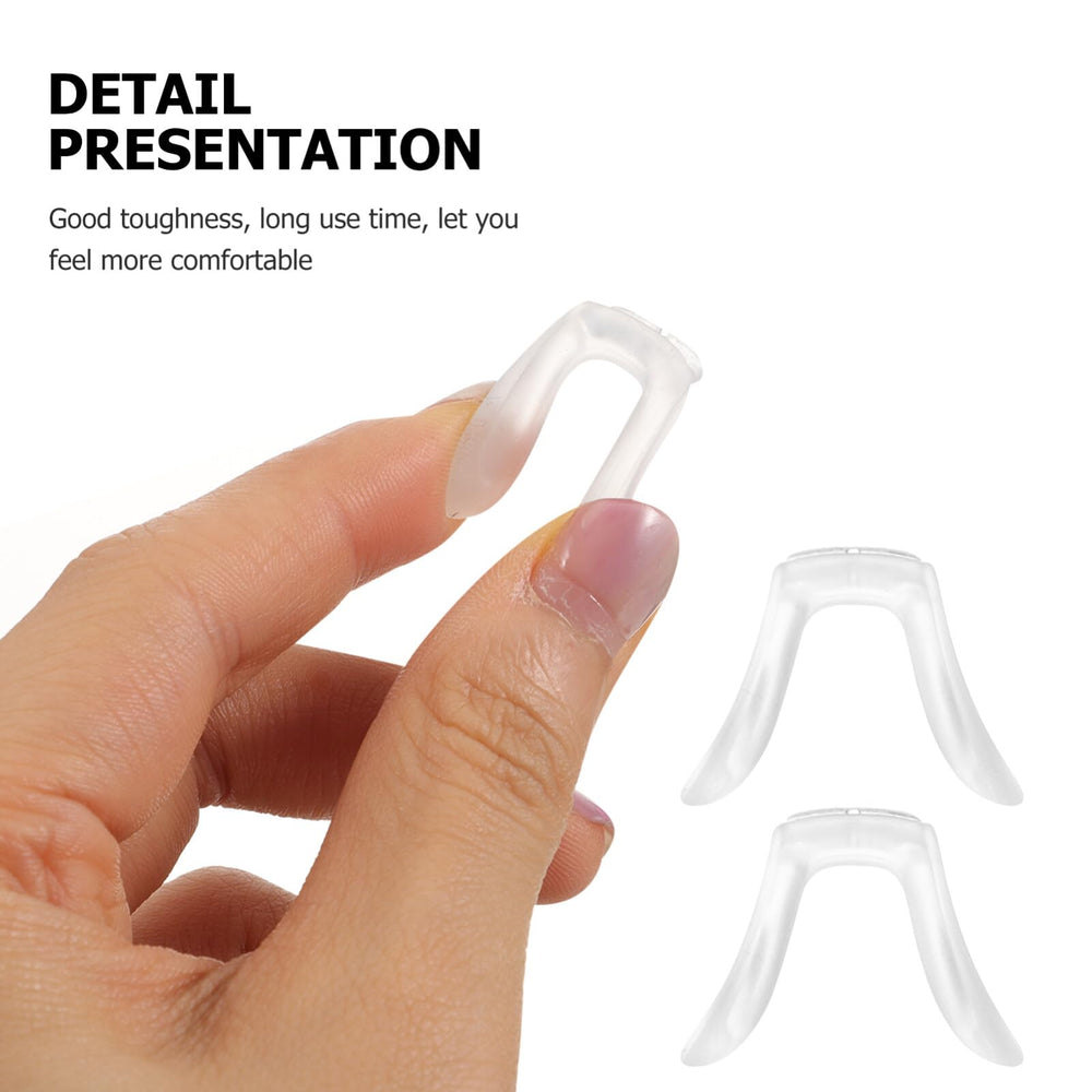 Soft silicone nose pad resting on the nose bridge