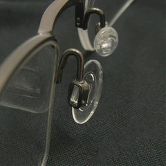 Push-in/snap-in/slide-on nose pad on frame