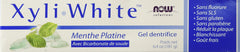 Close-up of XyliWhite Platinum Mint toothpaste tubes showing baking soda and 25% Xylitol