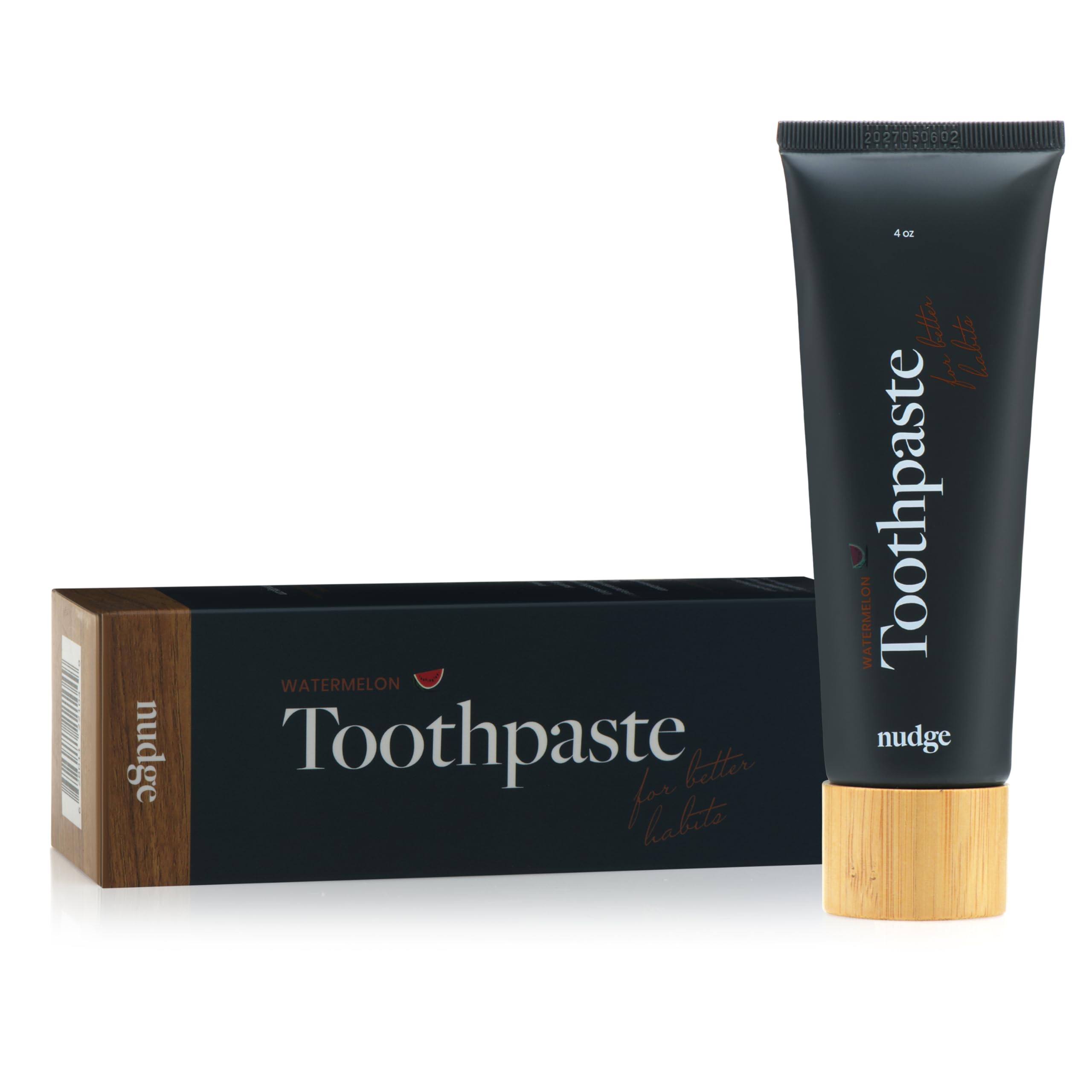 Smiling person brushing teeth with Nudge Watermelon toothpaste