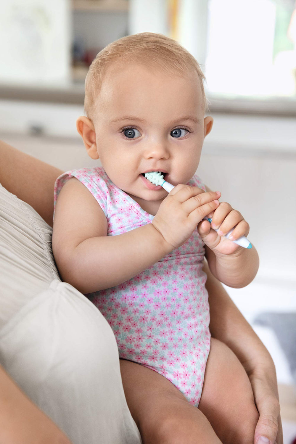Protective ring doubles as a stand for the toothbrush