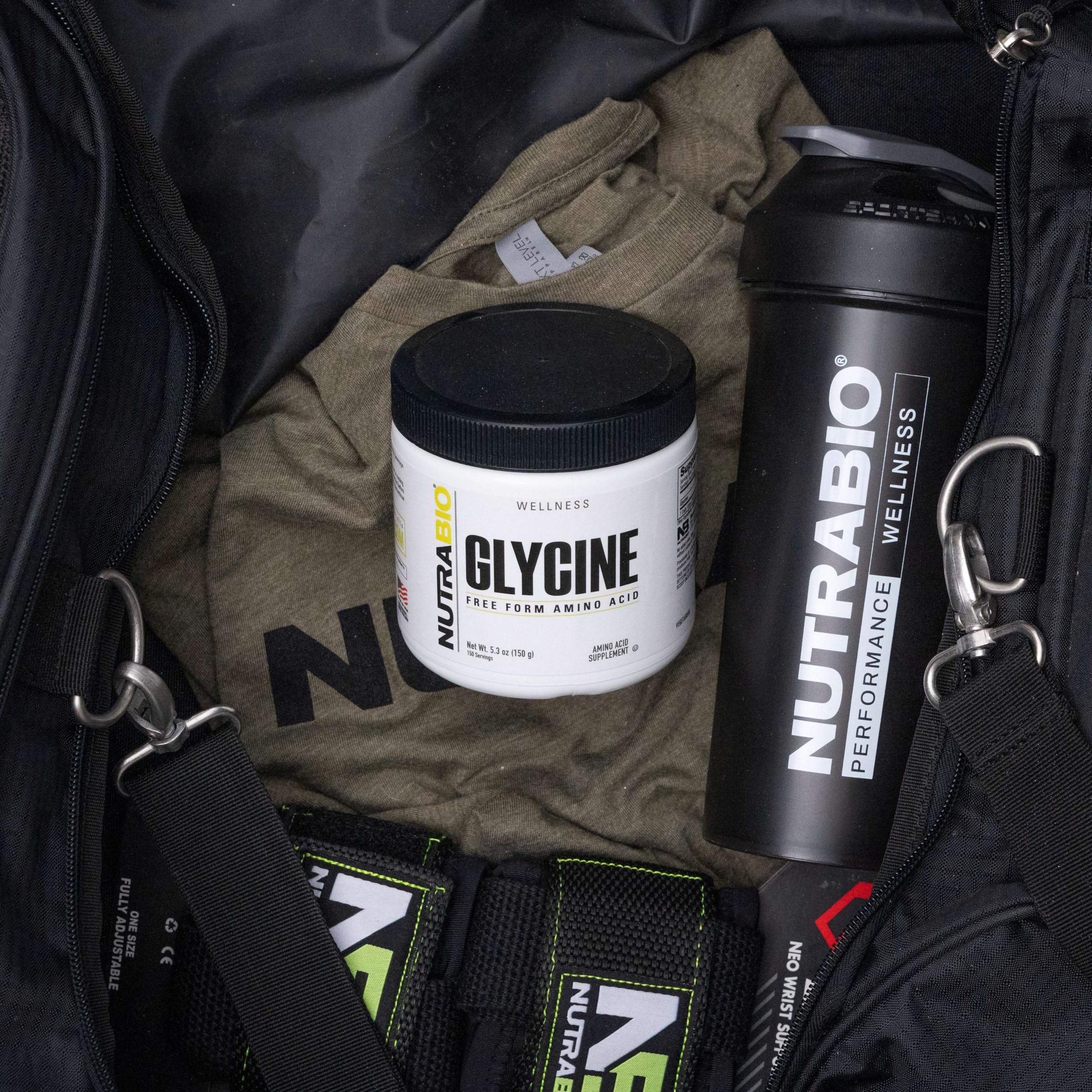 NutraBio glycine powder flat lay with container and scoop