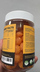 Close-up of Nutravita EAA Gummies Orange bottle label
