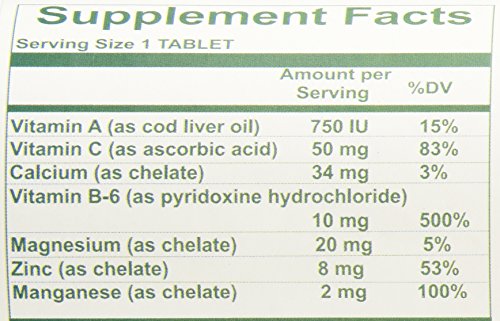 TOTAL MULTIMUNE bottle with capsules and label close-up
