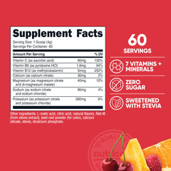 Scoop of powder and glass of fruit punch hydration