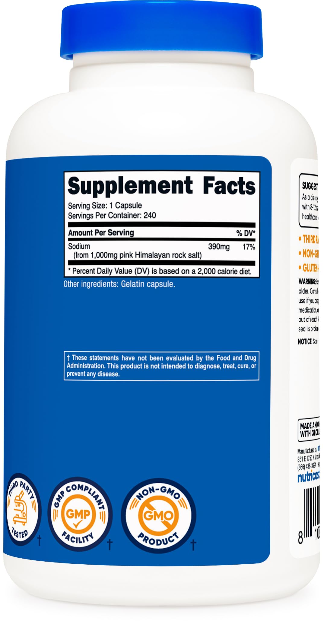 Pink Himalayan salt crystals beside capsules