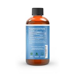 Pouring NutriNoche colloidal silver into a glass