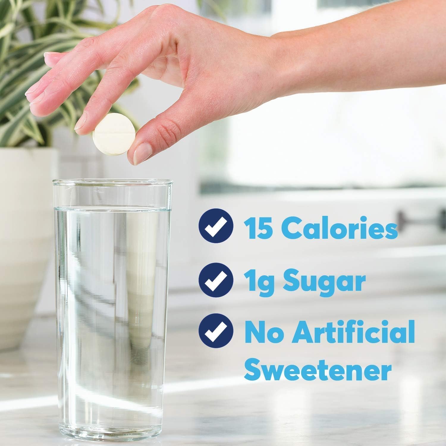 Dissolving Nuun Active Strawberry Lemonade tablet in water