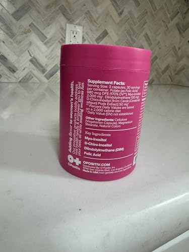 Serving guidance showing 3 capsules daily with water