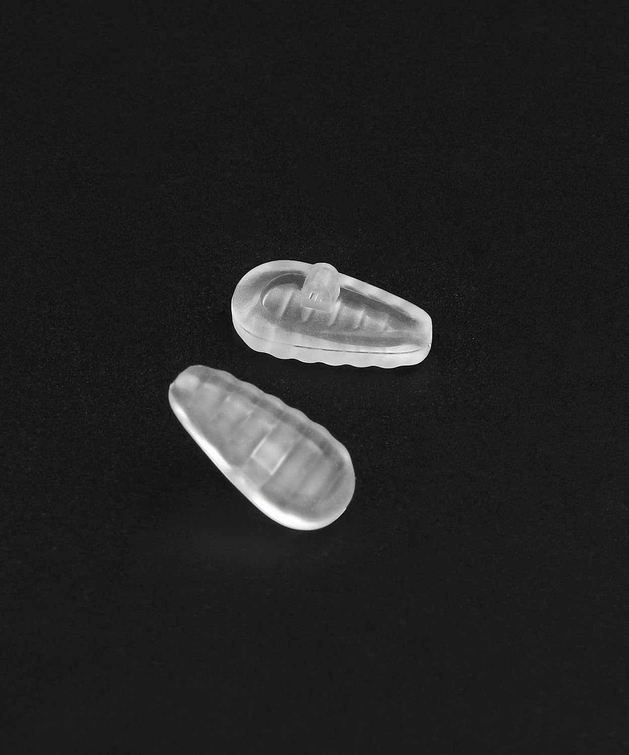 Packaging and six replacement nose pads for Oakley sunglasses