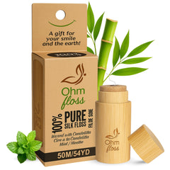 Product image of Ohm Floss silk dental floss with refillable bamboo holder