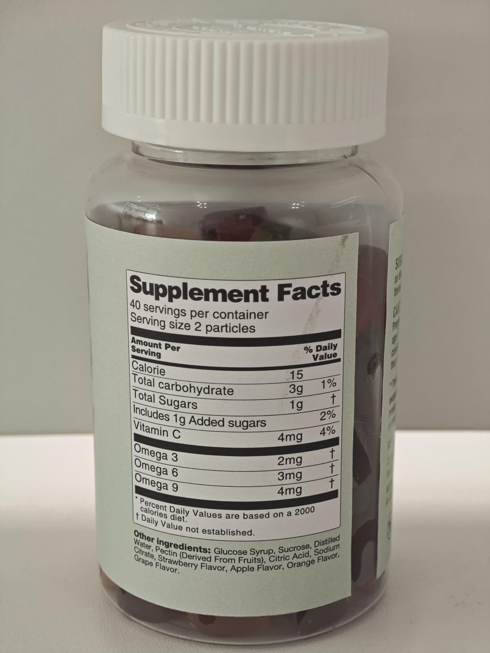 Close-up of Omega 3-6-9 gummies showing texture and color