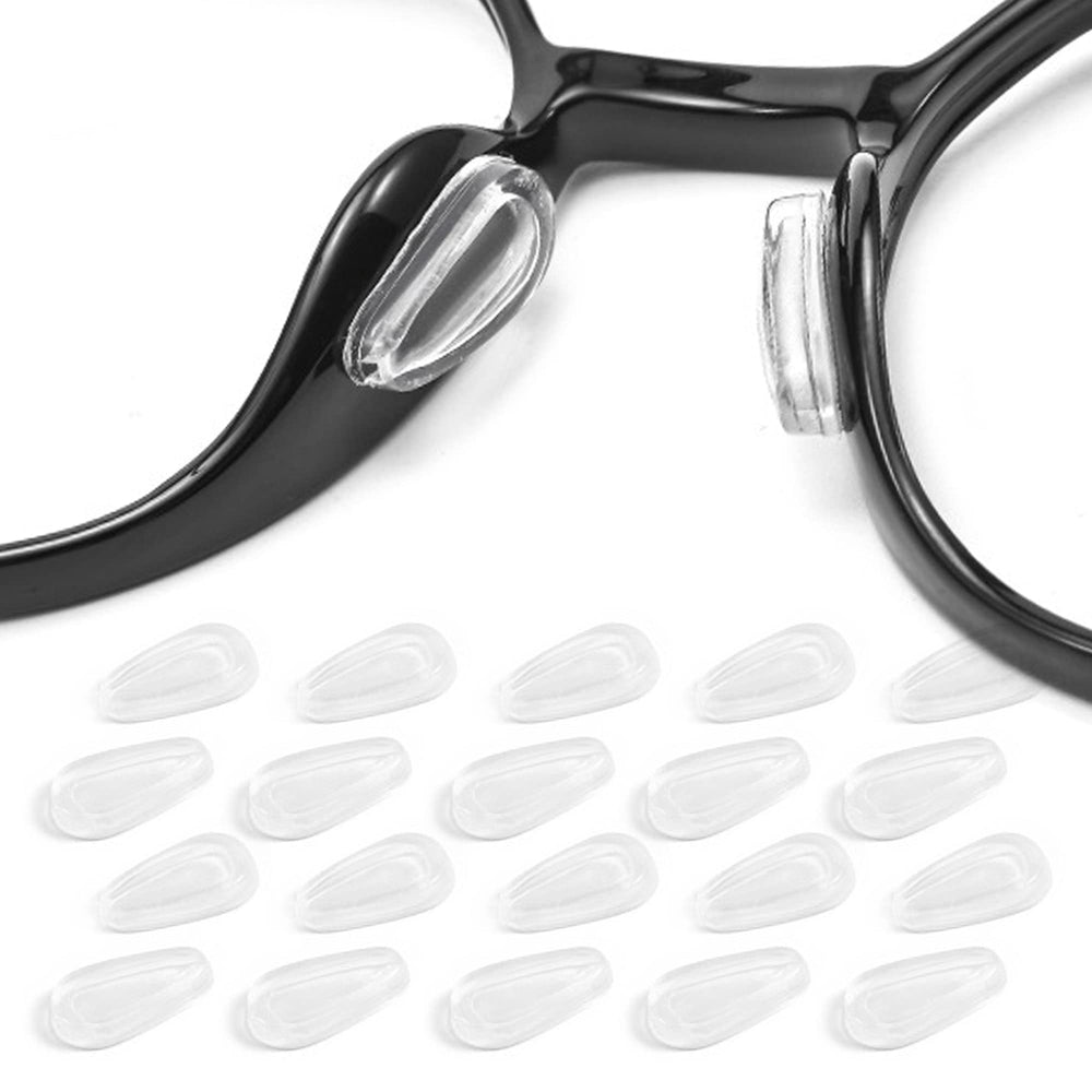 Close-up of Omnful adhesive eyeglass nose pads in clear color with air bag design