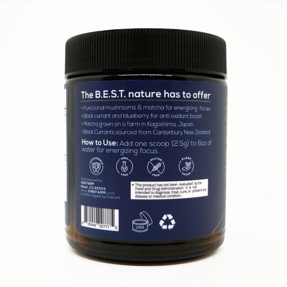 One Farm Energizing Focus Powder Blend scoop beside glass for daytime alertness