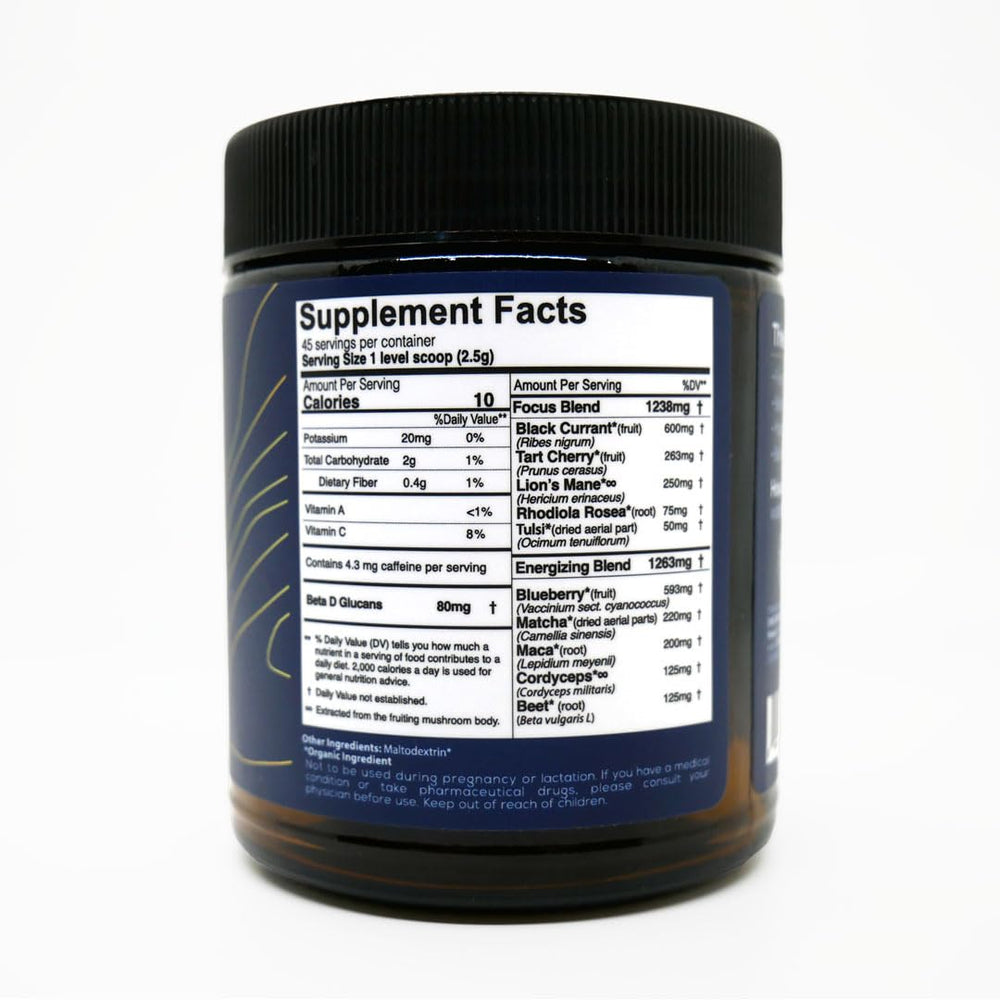Serving scoop of Tart Berry flavored focus powder in a glass jar