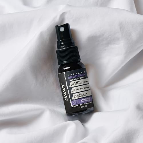 Bottle beside a glass of water