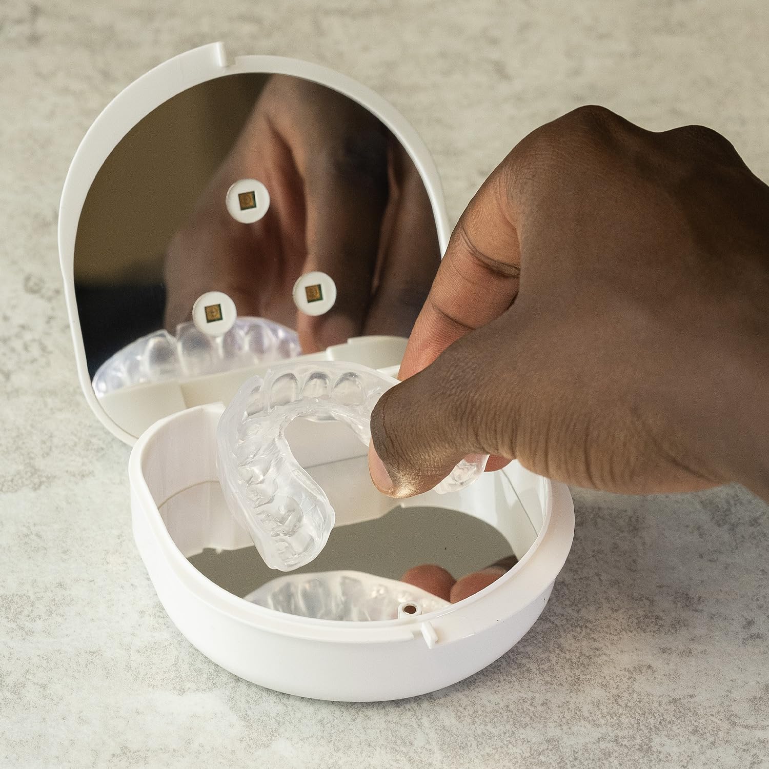 Interior of OPRO UV Cleaning Case showing two devices