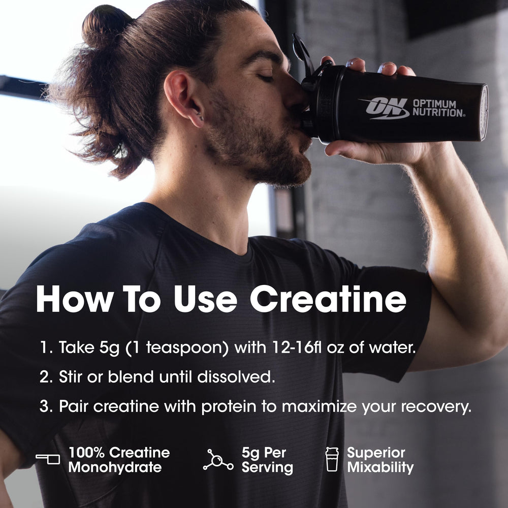 Workout-ready Optimum Nutrition creatine powder shown beside training gear.