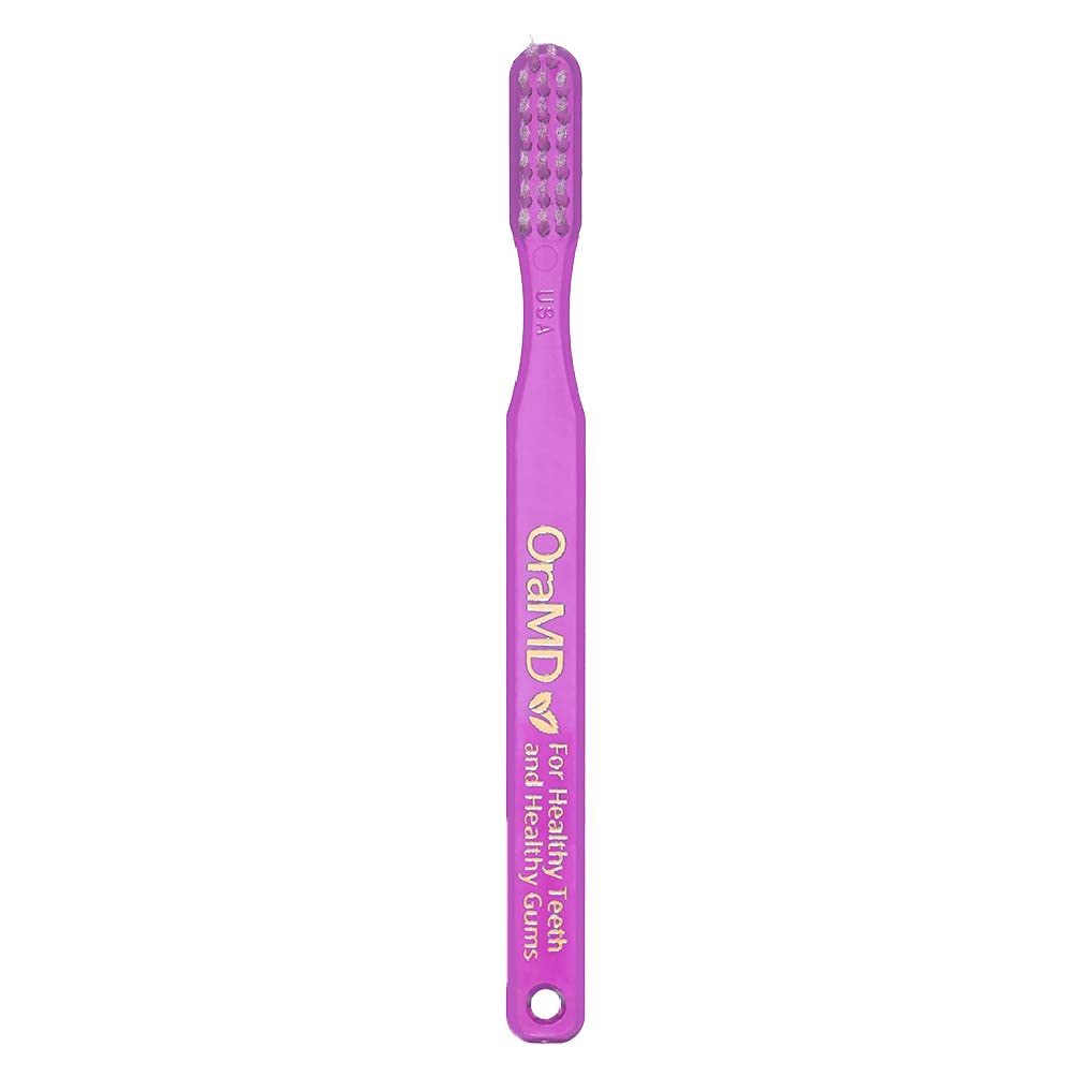 Close-up of soft nylon bristles on OraMD toothbrush
