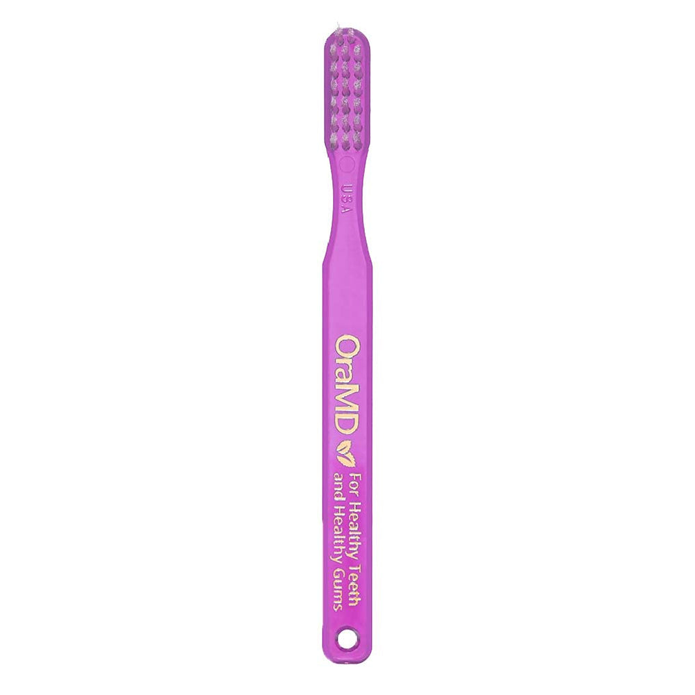 Close-up of soft nylon bristles on OraMD toothbrush