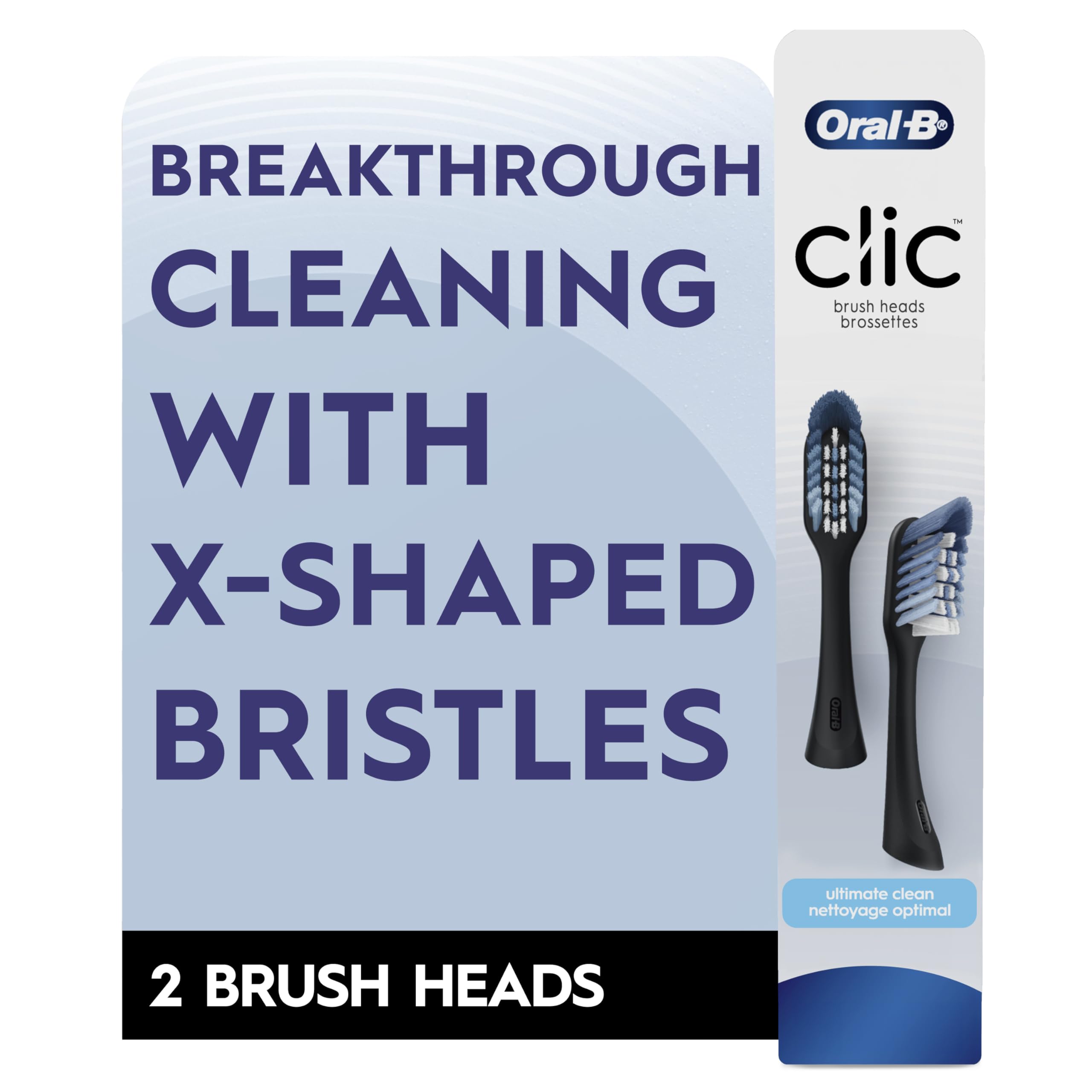 Oral-B Clic replacement heads held in hand