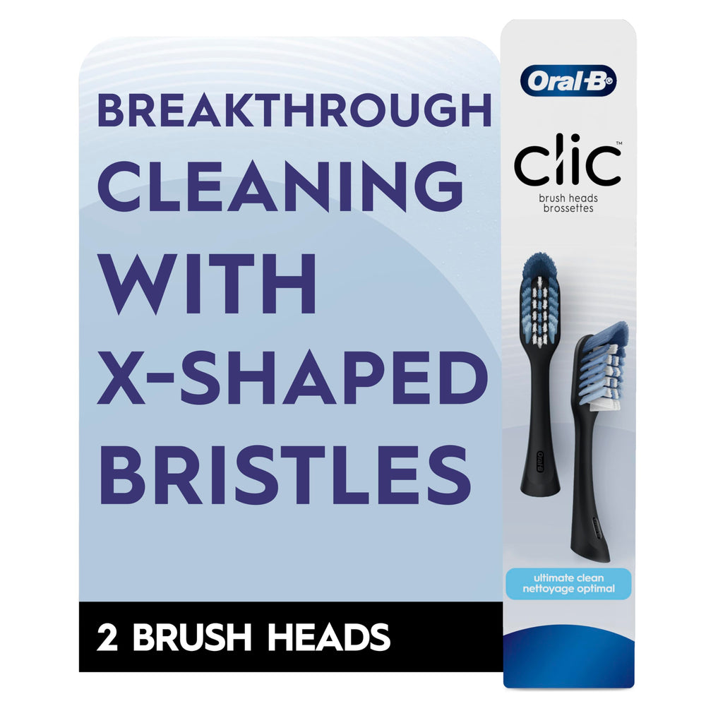 Oral-B Clic replacement heads held in hand