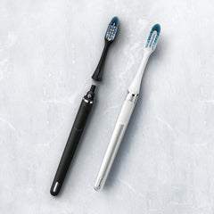 Oral-B Clic branding with replacement heads in black