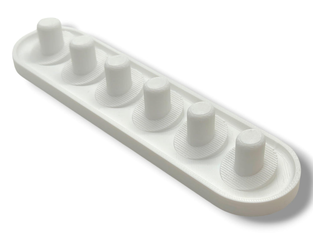 Handmade white 3D-printed Oral-B iO head holder holding 2-6 heads