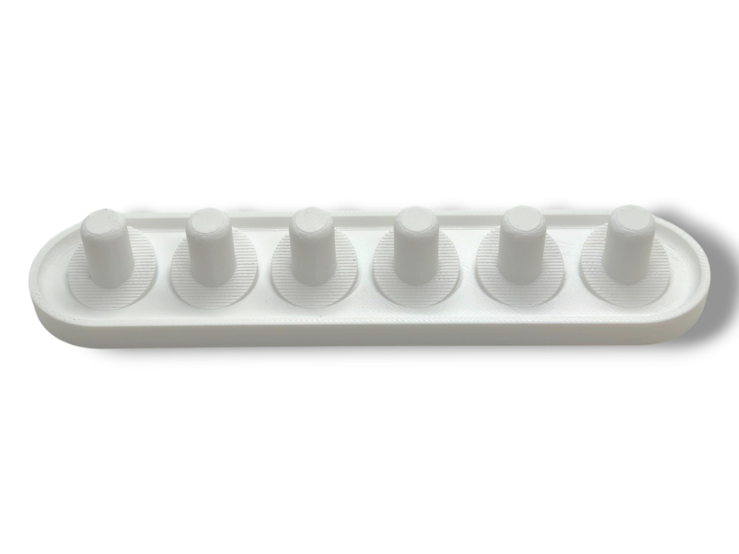 Side view of the Oral-B iO head holder's compact design